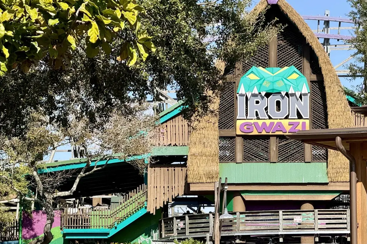 The entrance to the Iron Gwazi roller coaster at Busch Gardens Tampa Bay, under a thatched roof