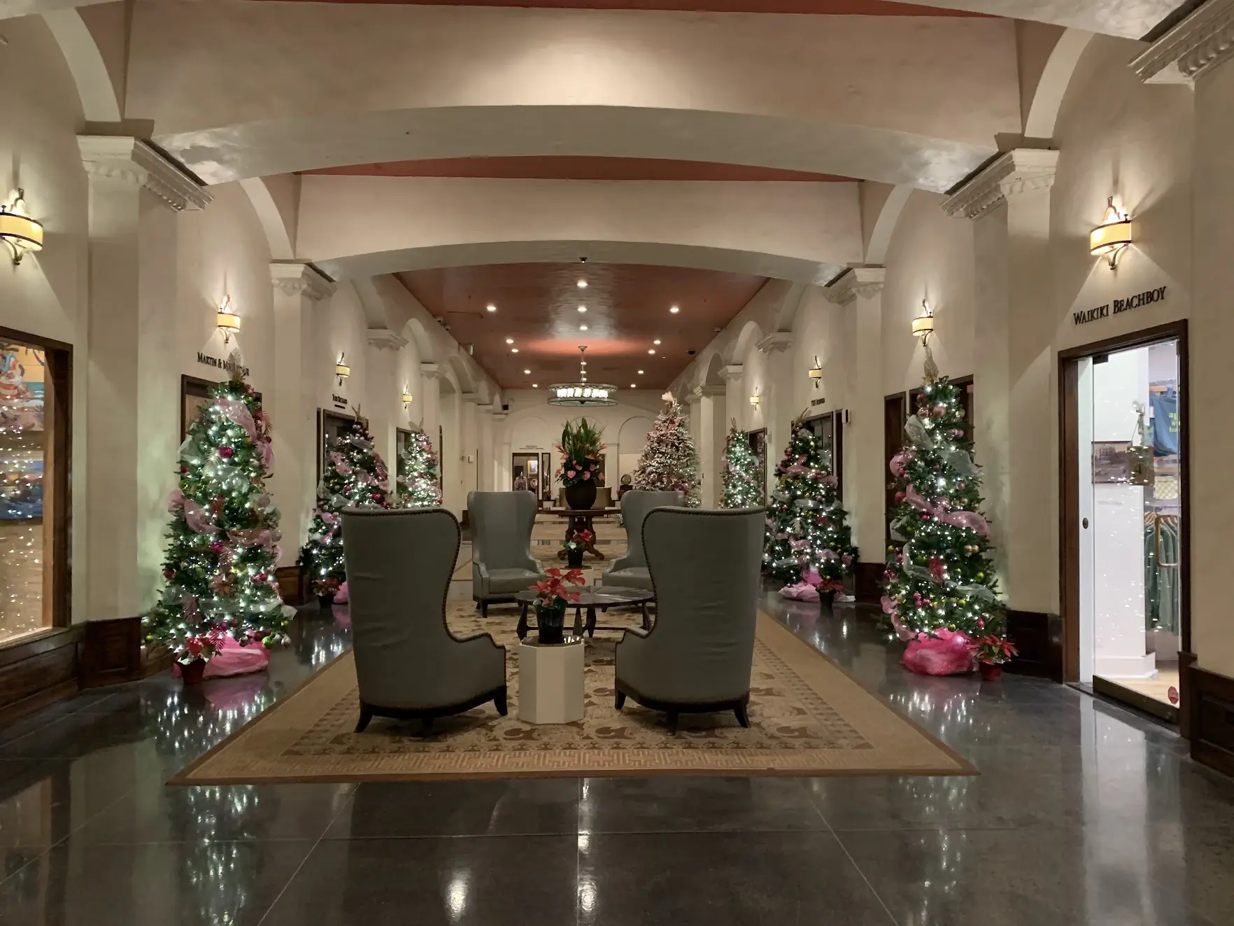 The Royal Hawaiian lobby decorated with Christmas trees in pink and green