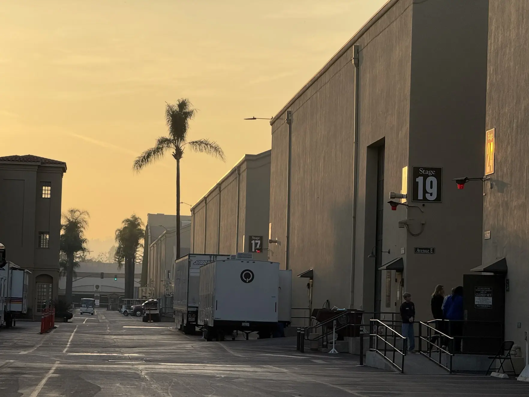 Soundstages 17 and 19 on the Warner Bros. lot at sunset, with palm trees